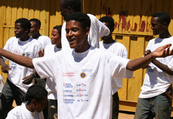 Students in Ethiopia dance while singing songs about the importance of trachoma prevention.